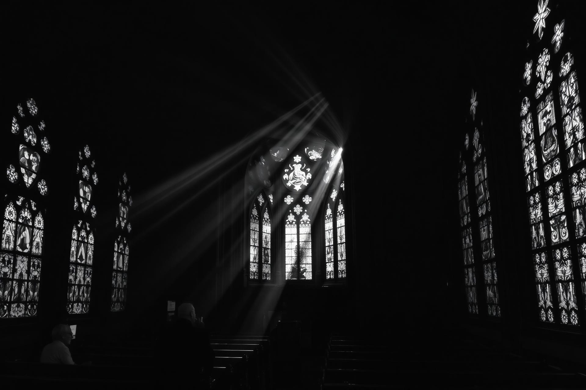 Cathedral interior with light beams